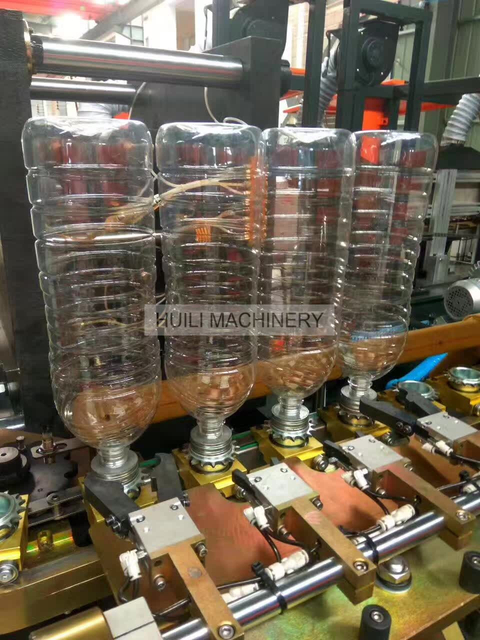 Última venda quente totalmente automática de 4 cavidades e 2 litros de garrafa de suco PET máquina de moldagem por sopro